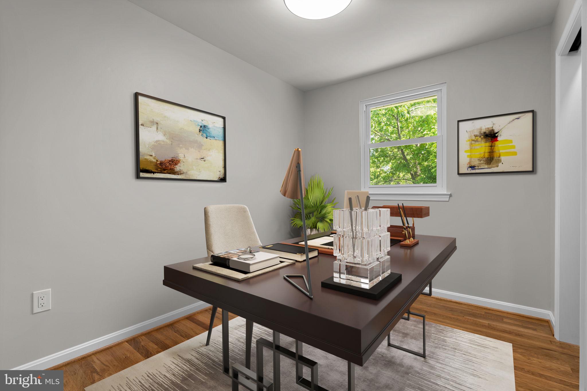5525 Rolling Road Springfield, VA 22151 - Photo 19 of 89 a view of a workspace with a table and couch