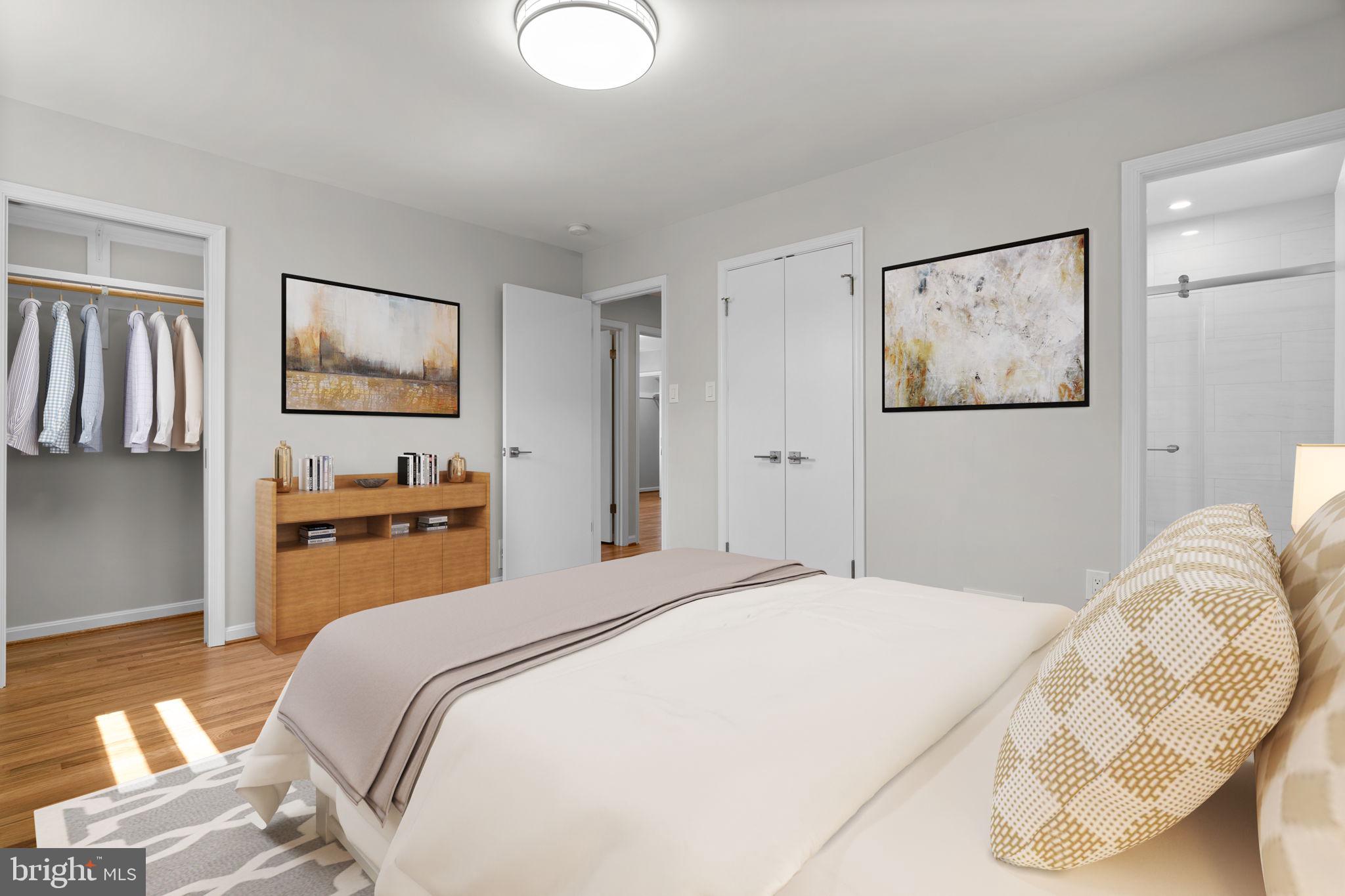 5525 Rolling Road Springfield, VA 22151 - Photo 27 of 89 a bedroom with a bed and a painting on the wall