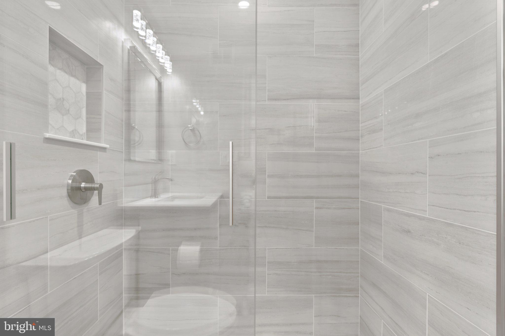 5525 Rolling Road Springfield, VA 22151 - Photo 28 of 89 a bathroom with a shower