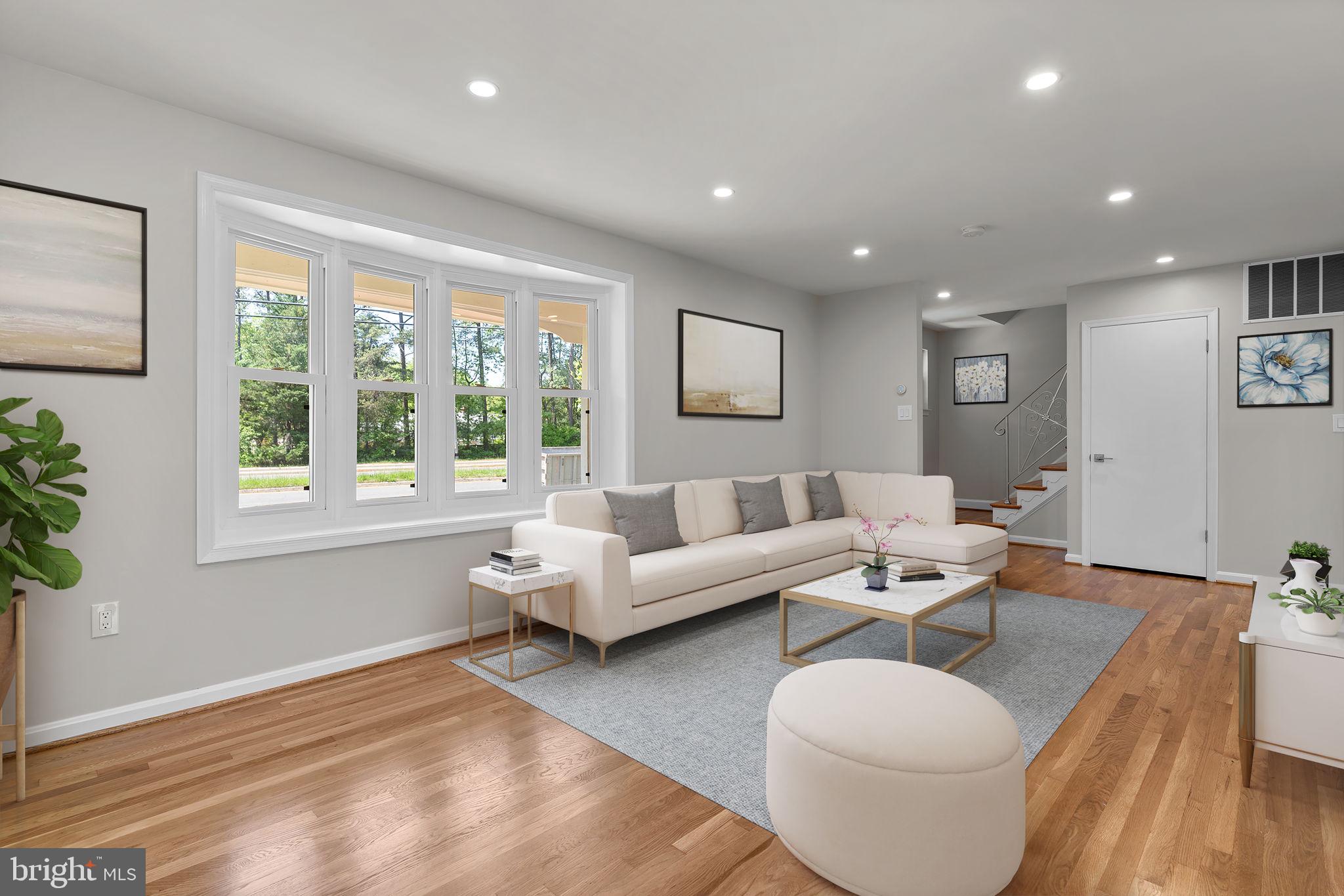 5525 Rolling Road Springfield, VA 22151 - Photo 7 of 89 a living room with furniture and a potted plant