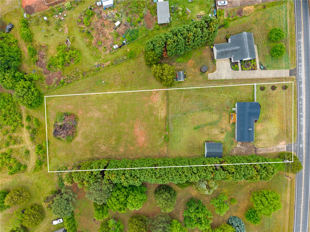 4508 Old Williamston Road Belton, SC 29627 - Photo 43 of 47 Expansive green spaces and structures from an elevated perspective.