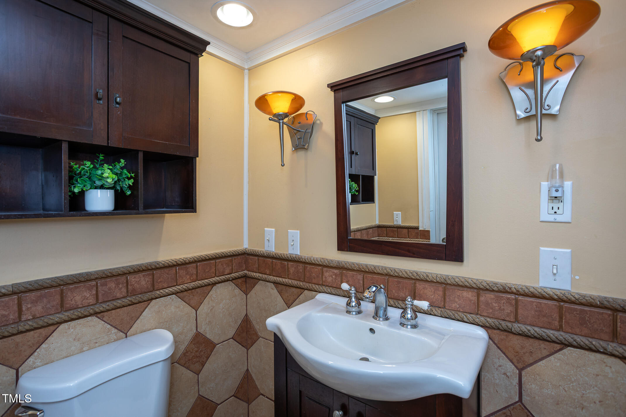 3622 Chestnut Ridge Church Road Efland, NC 27243 - Photo 13 of 22 a bathroom with a sink and a mirror