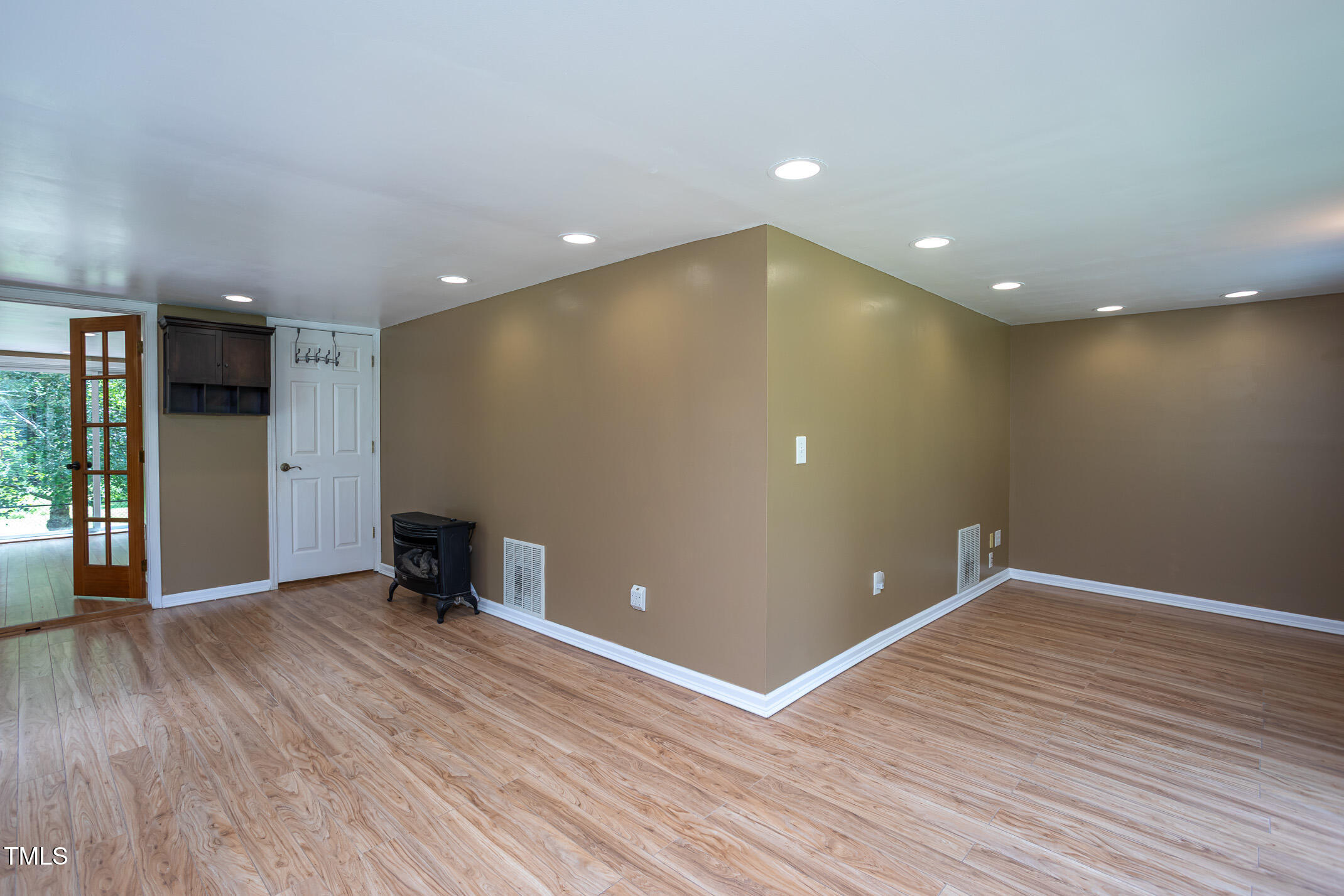 3622 Chestnut Ridge Church Road Efland, NC 27243 - Photo 16 of 22 a view of empty room with wooden floor