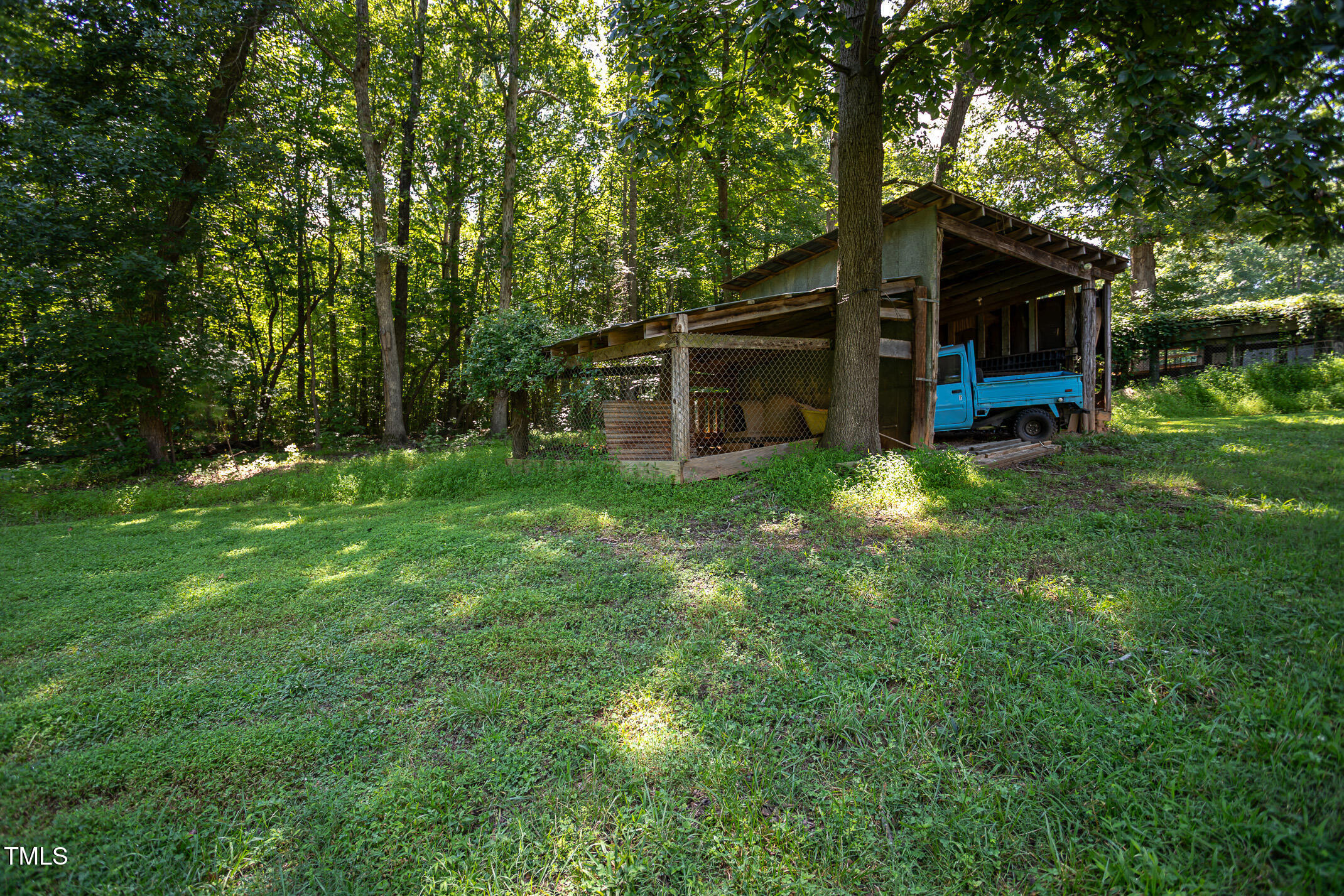 3622 Chestnut Ridge Church Road Efland, NC 27243 - Photo 20 of 22 a view of a house with backyard