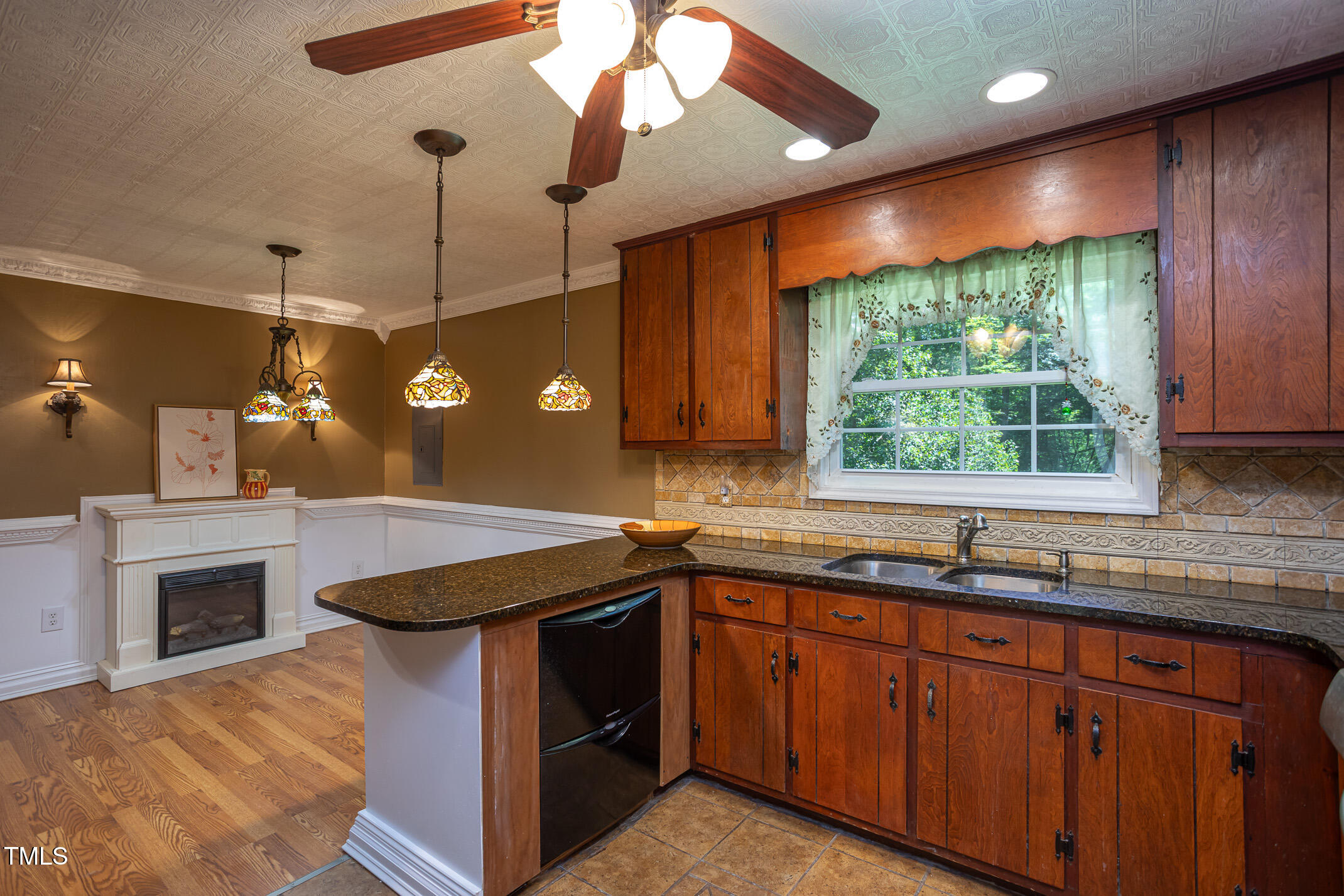 3622 Chestnut Ridge Church Road Efland, NC 27243 - Photo 5 of 22 a kitchen with a sink stove and cabinets