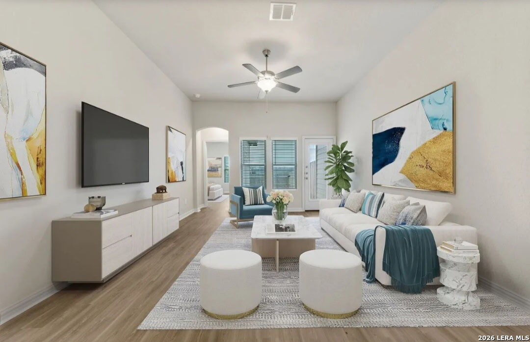 5423 Devils Gate Converse, TX 78109 - Photo 2 of 17 a living room with furniture and a flat screen tv