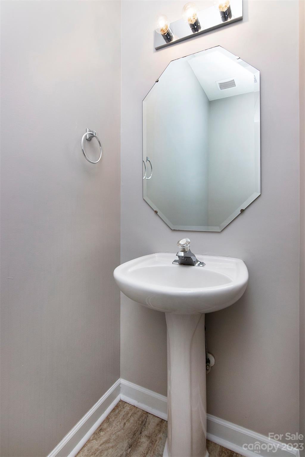 13111 Meadowmere Road Huntersville, NC 28078 - Photo 11 of 21 a bathroom with a sink and mirror