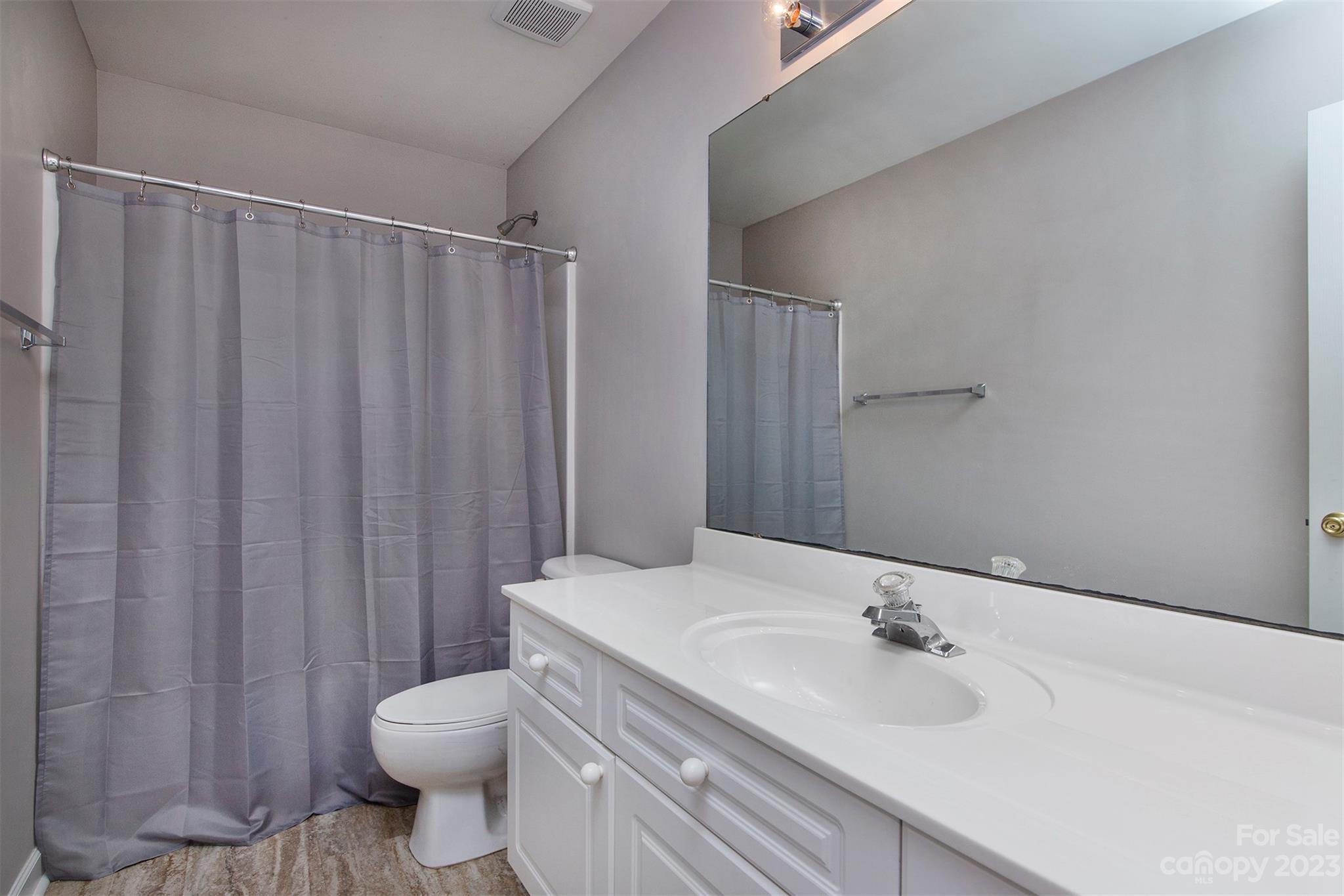 13111 Meadowmere Road Huntersville, NC 28078 - Photo 13 of 21 a bathroom with a sink toilet and shower