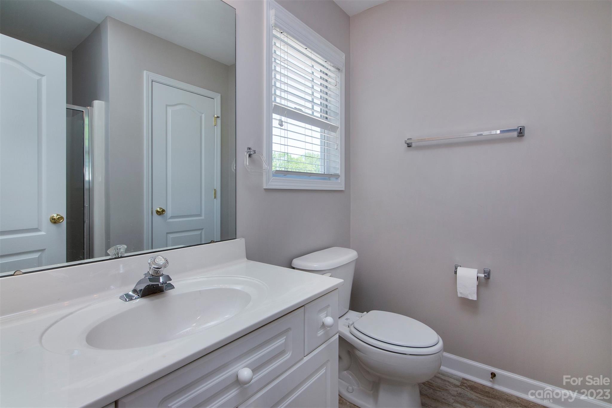 13111 Meadowmere Road Huntersville, NC 28078 - Photo 15 of 21 a bathroom with a sink and a toilet