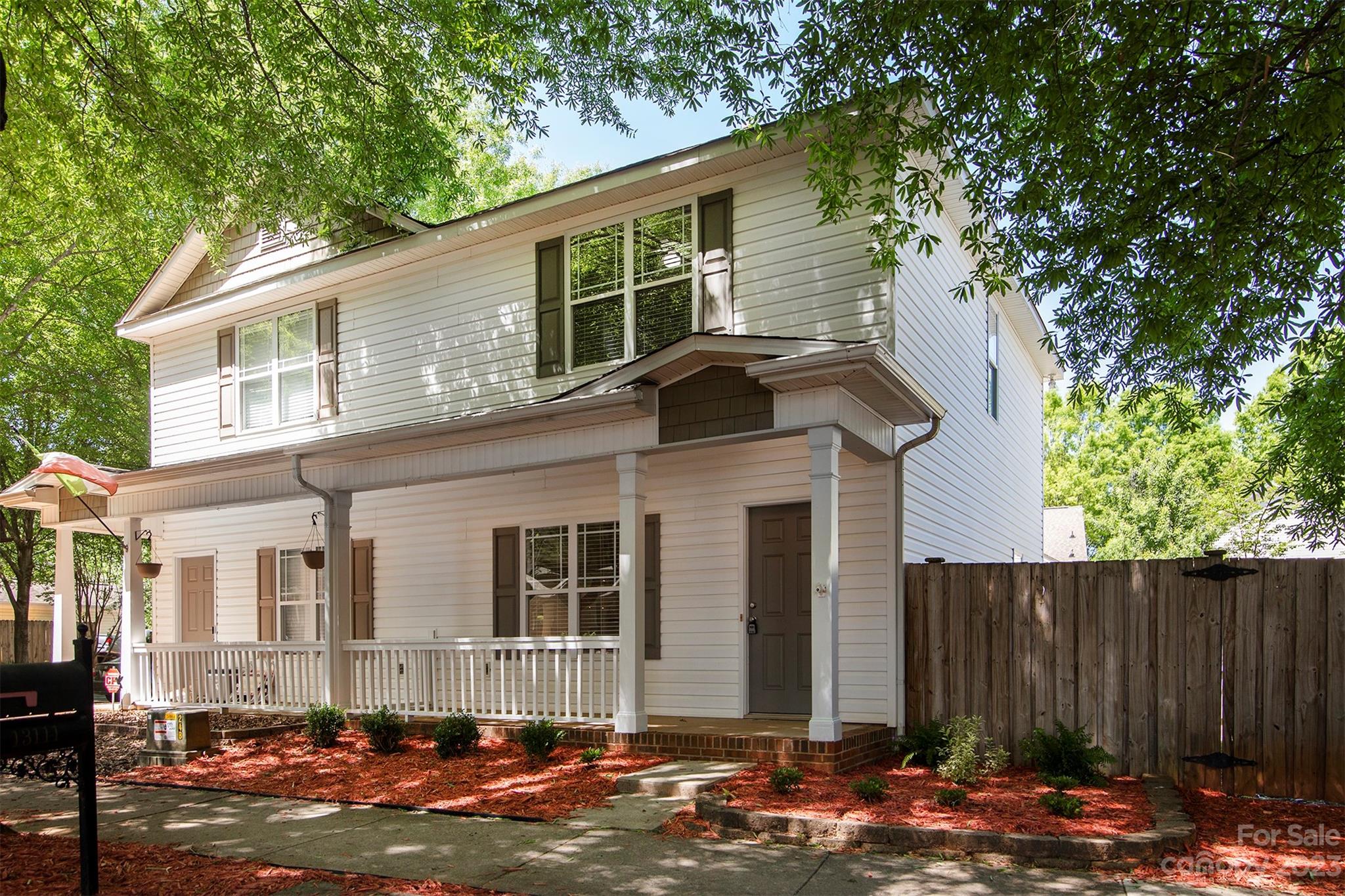 13111 Meadowmere Road Huntersville, NC 28078 - Photo 2 of 21 a front view of a house with a yard