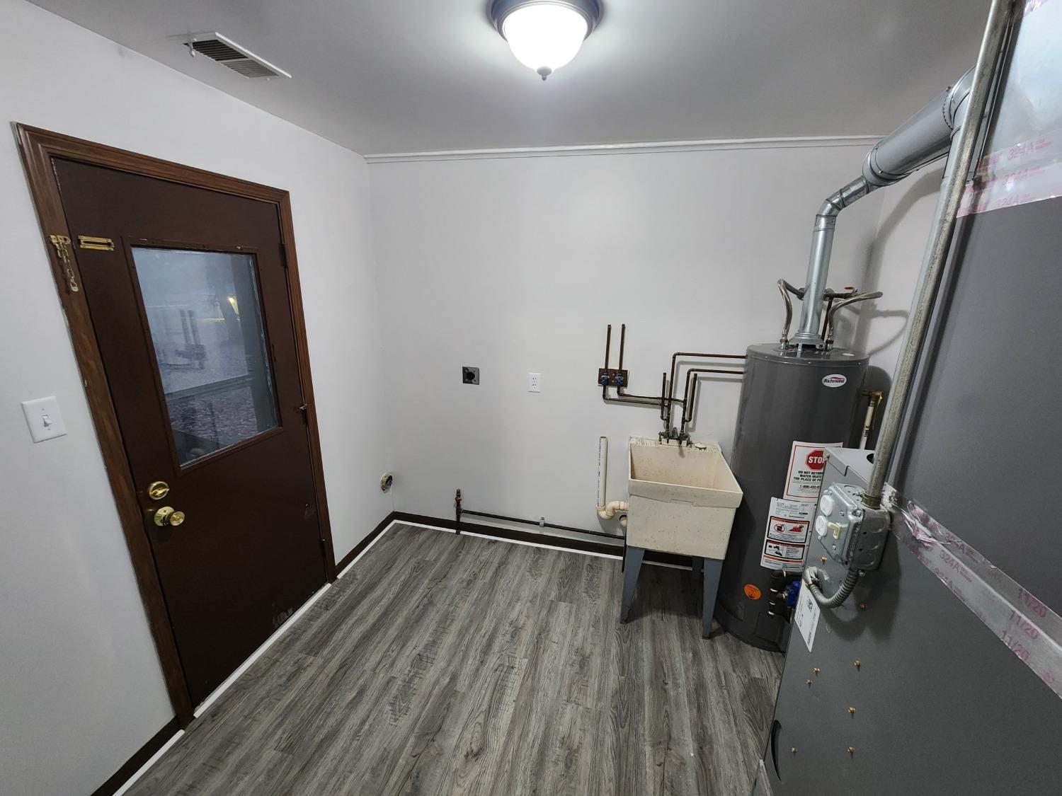 812 West Daumer Road, Unit C1 Kouts, IN 46347 - Photo 13 of 19 a view of entryway with wooden floor
