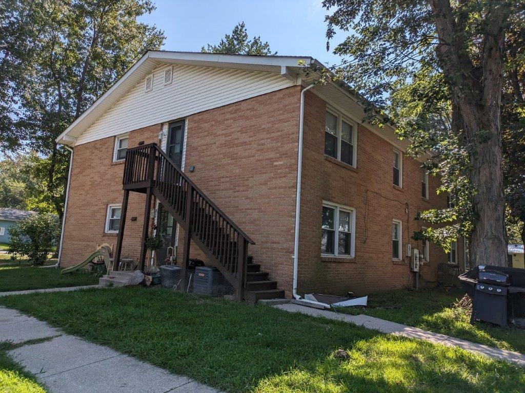 812 West Daumer Road, Unit C1 Kouts, IN 46347 - Photo 2 of 19 a backyard of a house with lots of green space