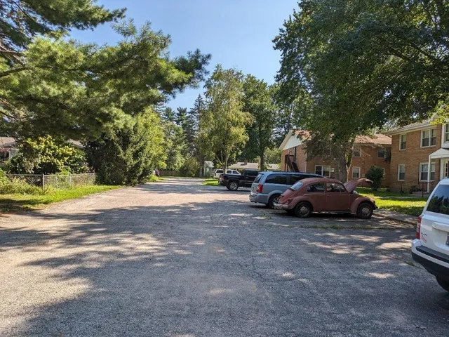 a view of cars parked in a parking lot