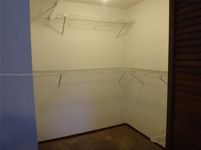 a view of small space with racks on the wall