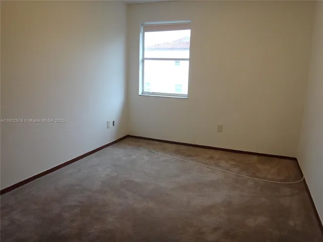 a view of a hallway with entryway