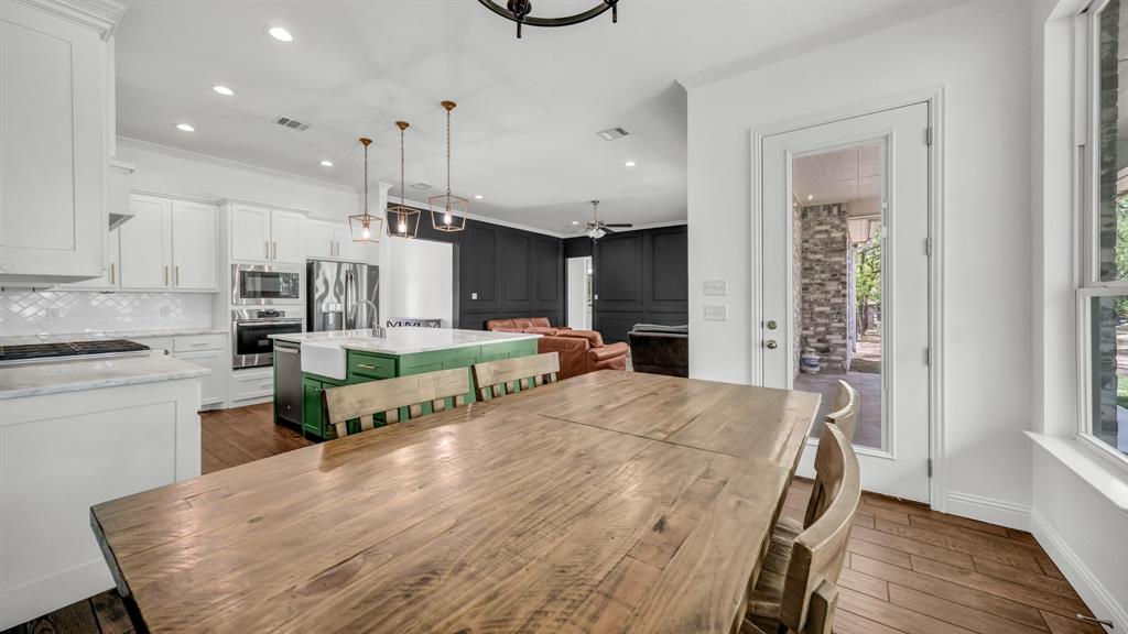 115 Post Oak Way Weatherford, TX 76087 - Photo 13 of 39 Dining room with dark wood-style floors, recessed lighting, and a ceiling fan