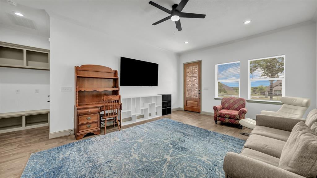 115 Post Oak Way Weatherford, TX 76087 - Photo 27 of 39 Living area featuring light wood-type flooring, recessed lighting, and a ceiling fan