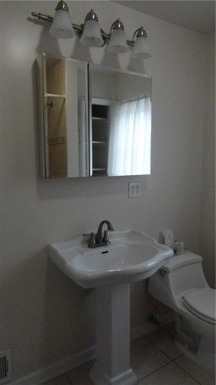 212 North Duffy Road Butler, PA 16001 - Photo 20 of 25 Pedestal sinks in both Baths, note the linen closet reflected in mirror. This is in addition to a good linen closet in main hallway.