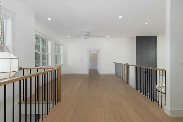 a view of hallway with stairs