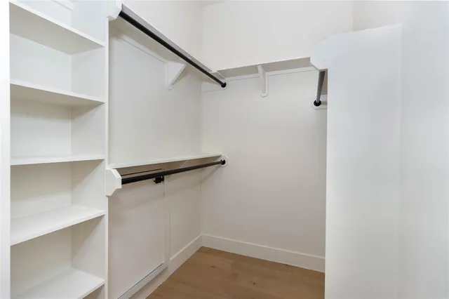 a view of an empty walk in closet