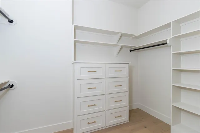 a view of an empty walk in closet