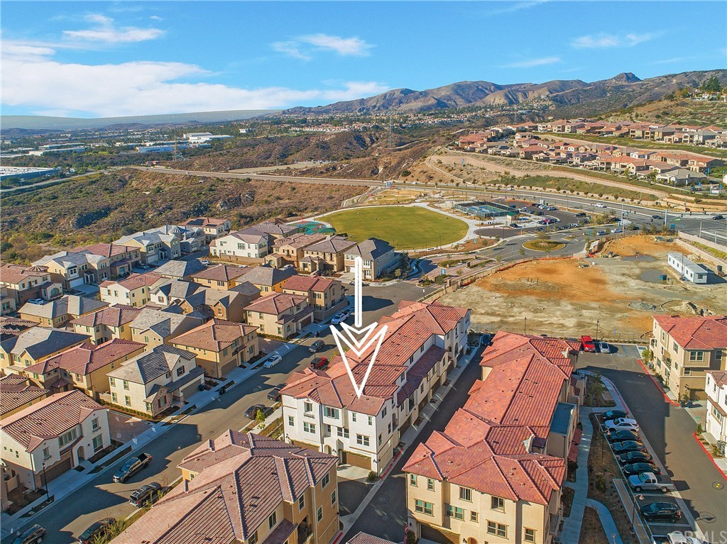Stunning surroundings and every amenity await in this beautiful Copperleaf end unit townhome.