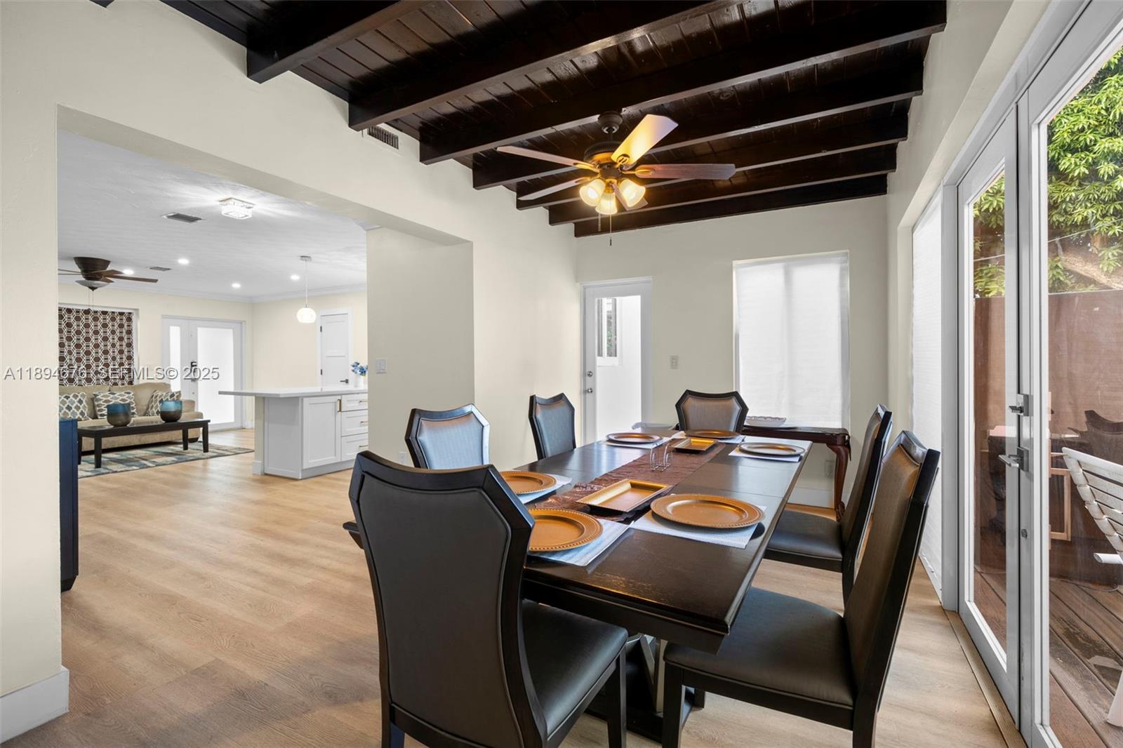 1271 Northwest 87th Street Miami, FL 33147 - Photo 11 of 29 a view of a dining room with furniture