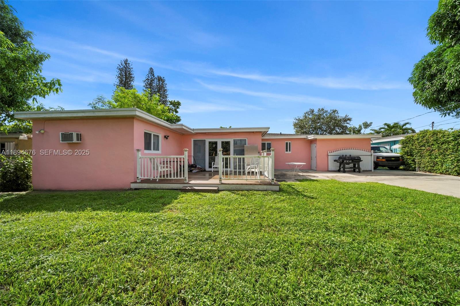 1271 Northwest 87th Street Miami, FL 33147 - Photo 28 of 29 a house view with a garden space