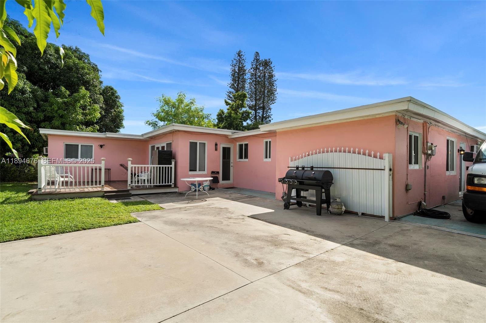 1271 Northwest 87th Street Miami, FL 33147 - Photo 29 of 29 a view of house with a patio
