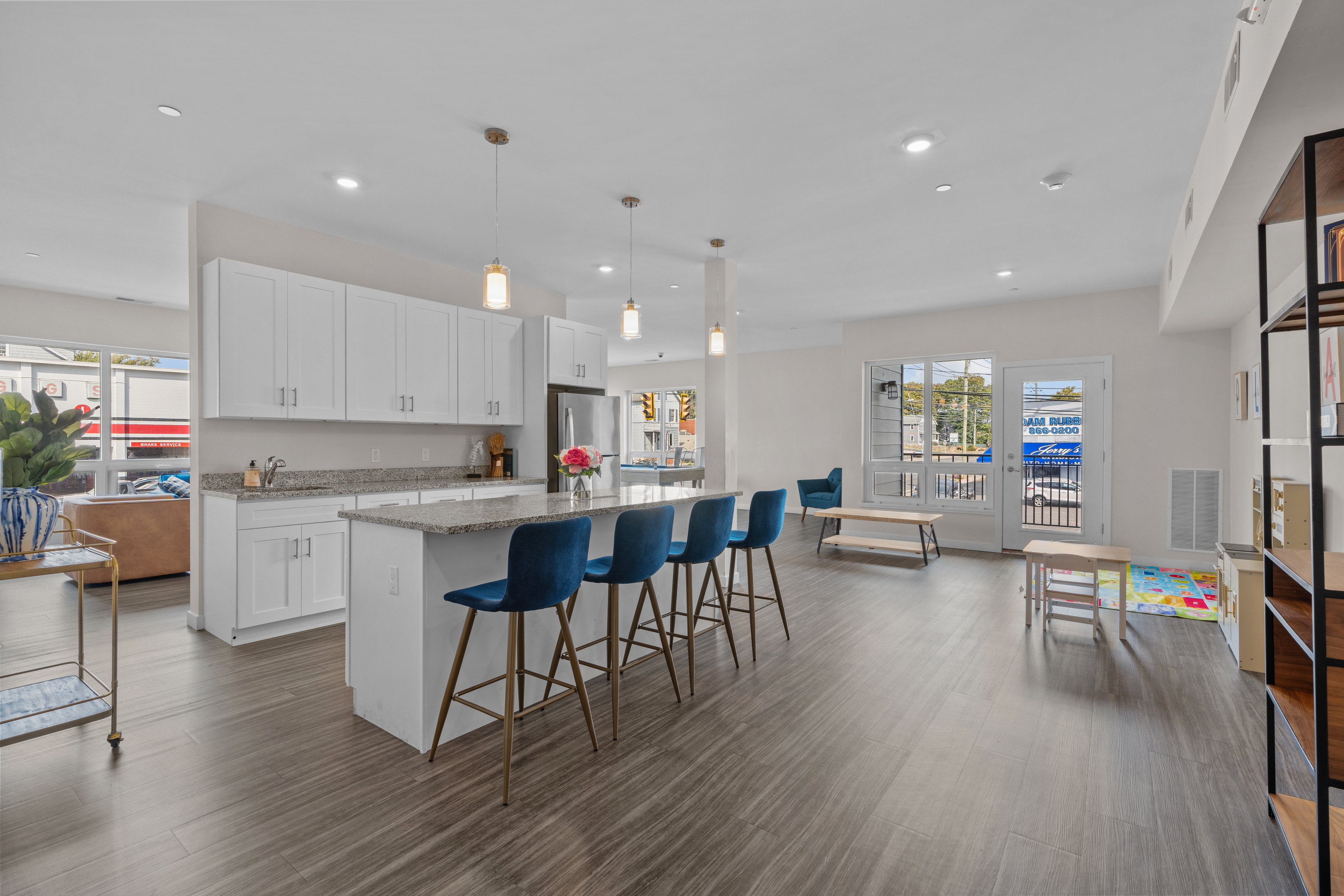 71 Connecticut Avenue, Unit 410 Norwalk, CT 06850 - Photo 1 of 17 a open dining room with stainless steel appliances granite countertop a stove a sink a refrigerator and white cabinets with wooden floor