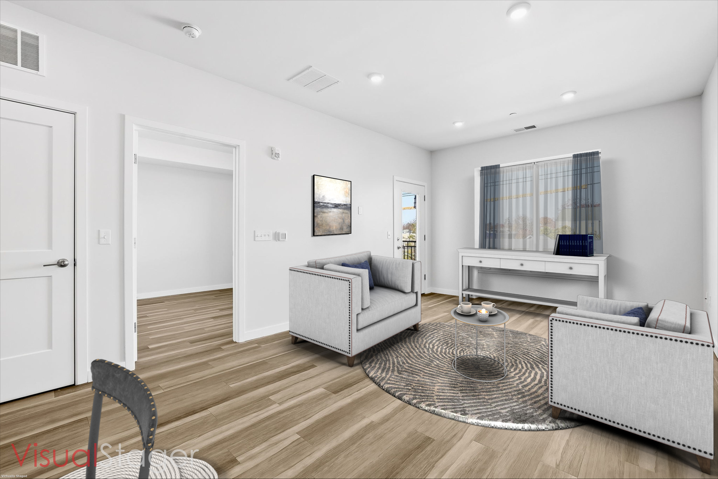 71 Connecticut Avenue, Unit 410 Norwalk, CT 06850 - Photo 12 of 17 a living room with furniture and a wooden floor