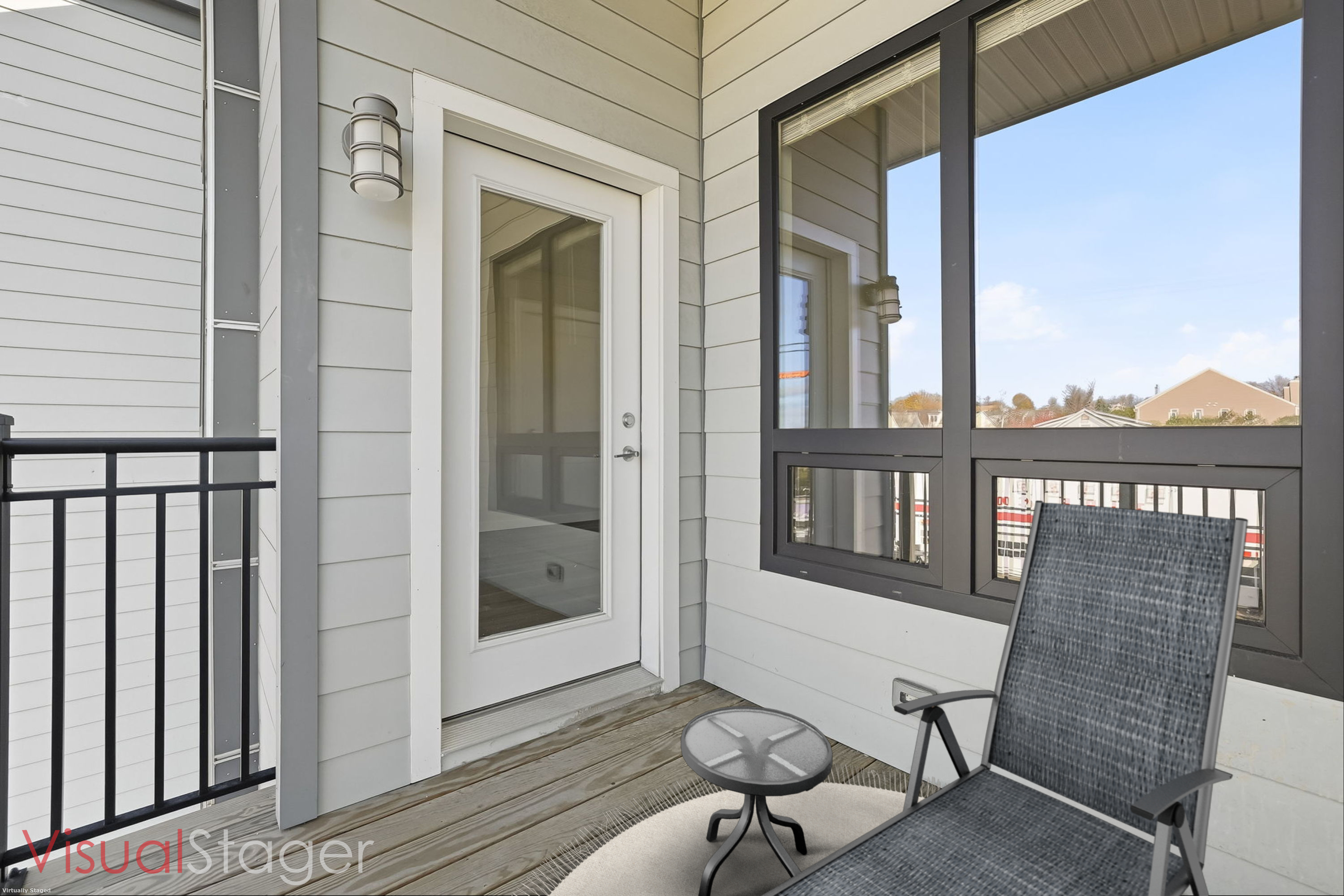 71 Connecticut Avenue, Unit 410 Norwalk, CT 06850 - Photo 13 of 17 a front view of a house with wooden floor and a yard