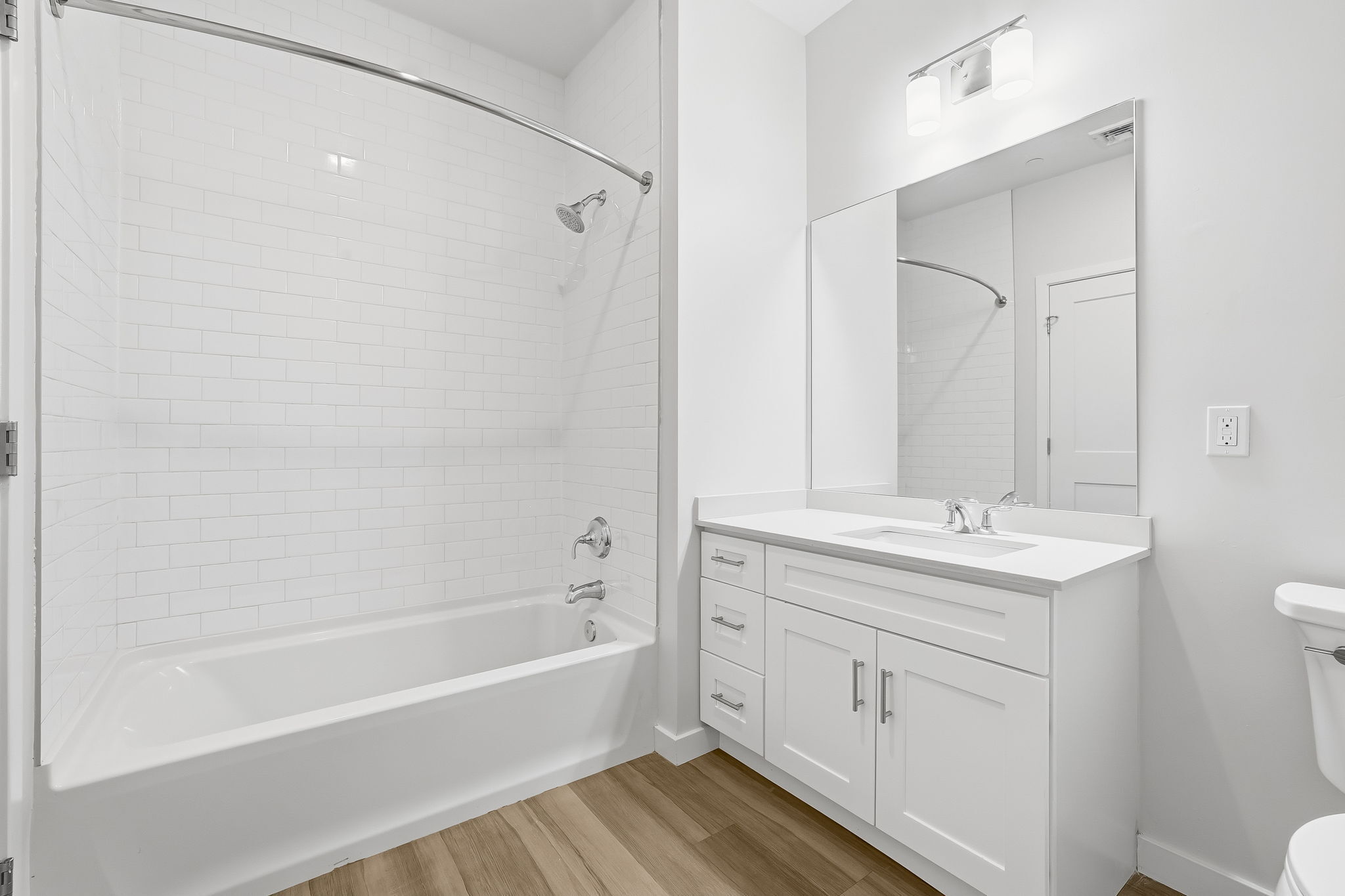 71 Connecticut Avenue, Unit 410 Norwalk, CT 06850 - Photo 16 of 17 a bathroom with a sink a toilet and shower