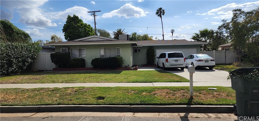 4106 Overland Street Riverside, CA 92503 - Photo 1 of 1 a front view of a house with garden