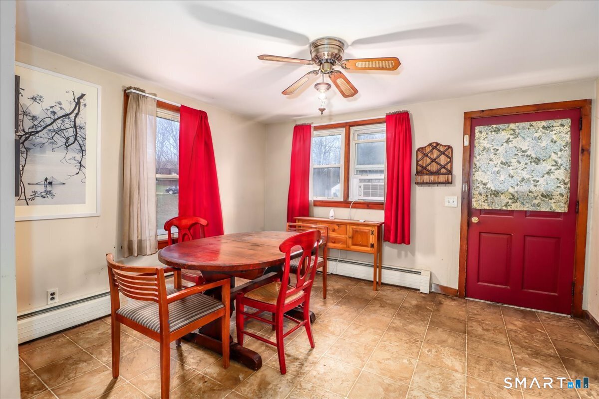 2 Sawmill Road Sherman, CT 06784 - Photo 11 of 40 a dining room with furniture and window