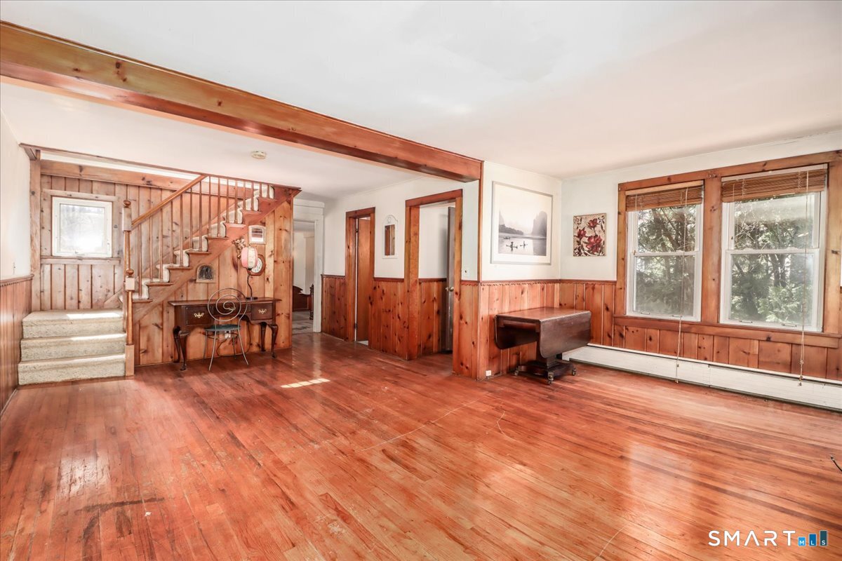 2 Sawmill Road Sherman, CT 06784 - Photo 13 of 40 a view of a livingroom with furniture and a fireplace