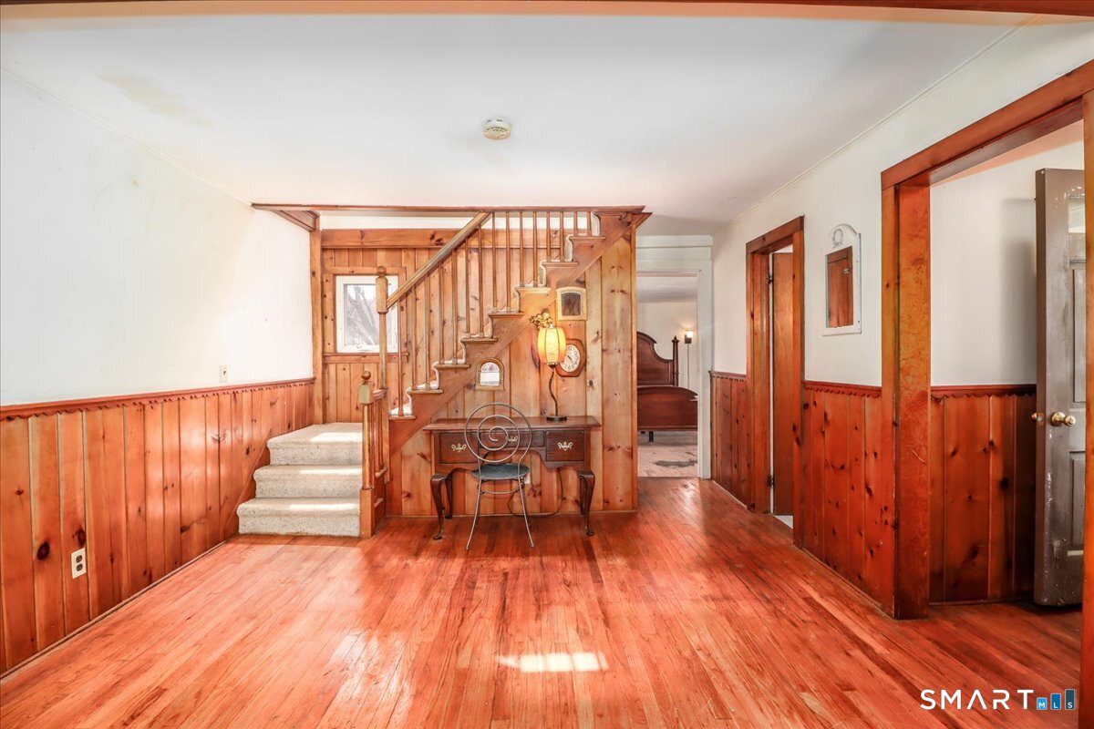 2 Sawmill Road Sherman, CT 06784 - Photo 20 of 40 wooden floor in an empty room with a large window