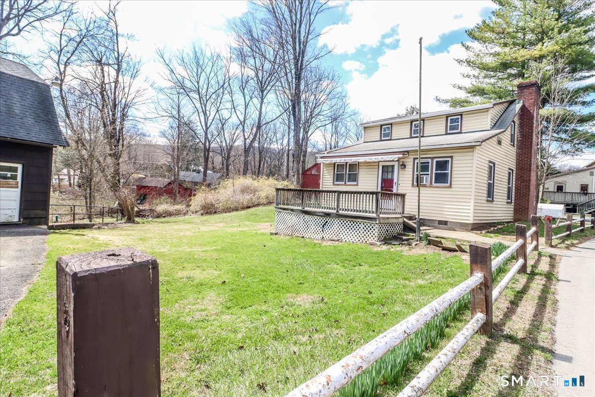 2 Sawmill Road Sherman, CT 06784 - Photo 2 of 40 a view of a house with swimming pool and a yard