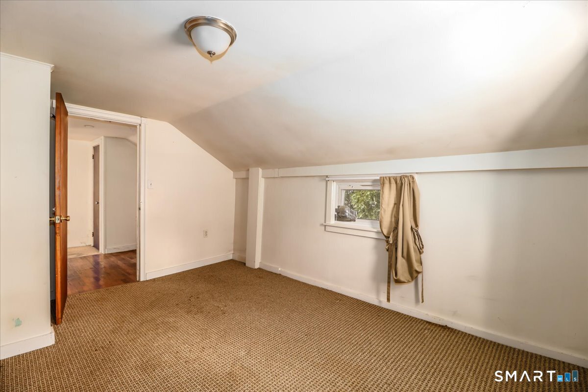 2 Sawmill Road Sherman, CT 06784 - Photo 30 of 40 a view of a room with rack on the wall