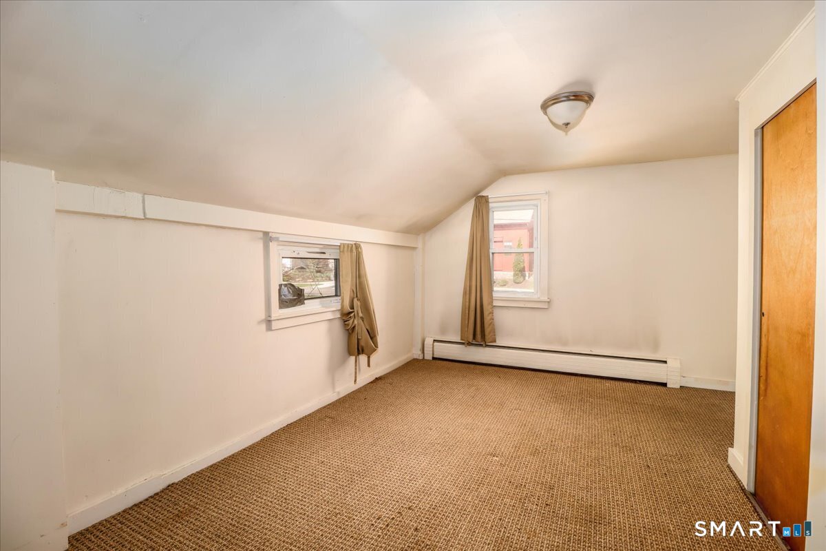 2 Sawmill Road Sherman, CT 06784 - Photo 32 of 40 an empty room with windows