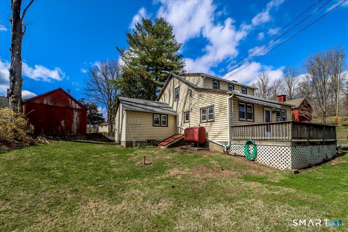2 Sawmill Road Sherman, CT 06784 - Photo 38 of 40 a view of a house with a patio
