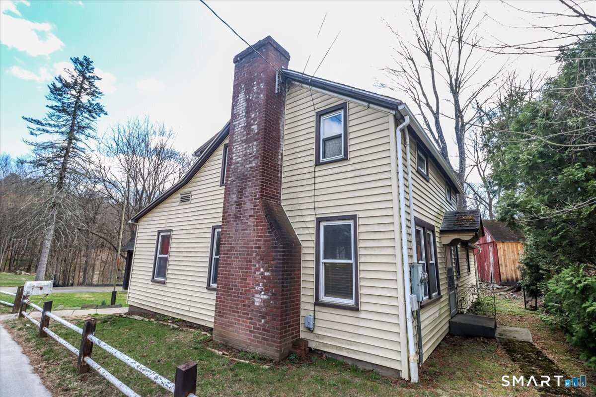 2 Sawmill Road Sherman, CT 06784 - Photo 4 of 40 a view of a house with a yard