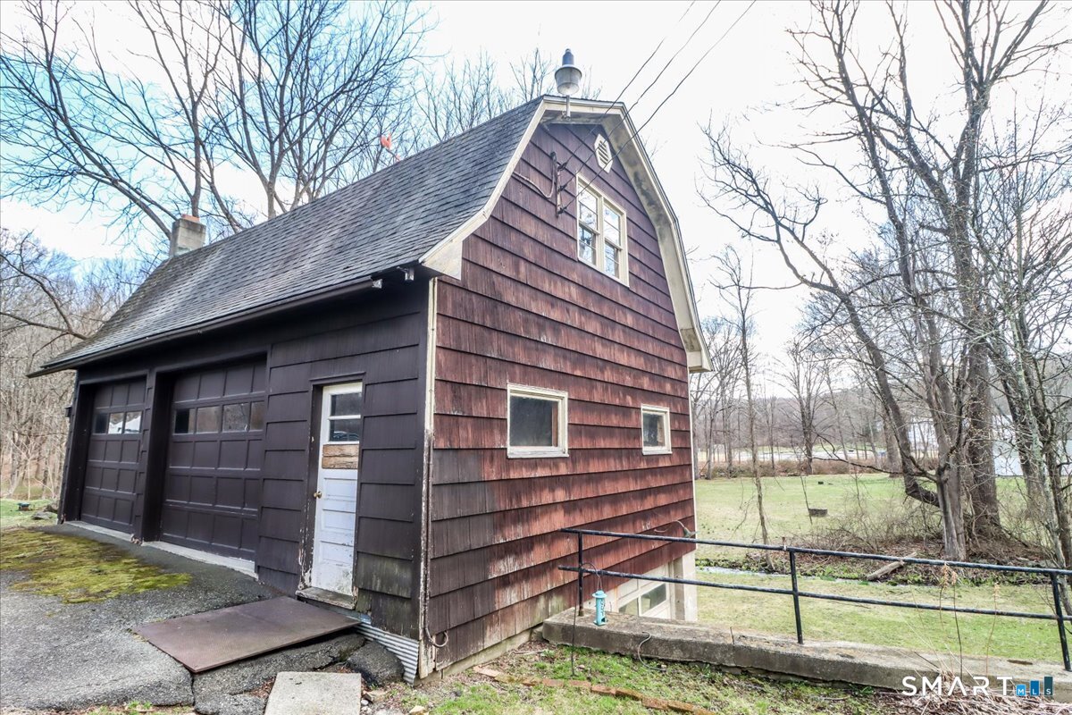 2 Sawmill Road Sherman, CT 06784 - Photo 6 of 40 a view of a house with a yard