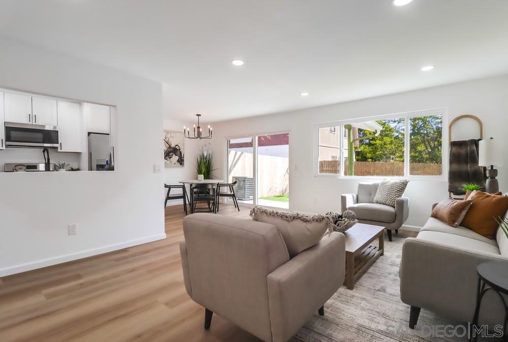 2821 Rosedale Way Spring Valley, CA 91977 - Photo 11 of 70 a living room with furniture and a large window