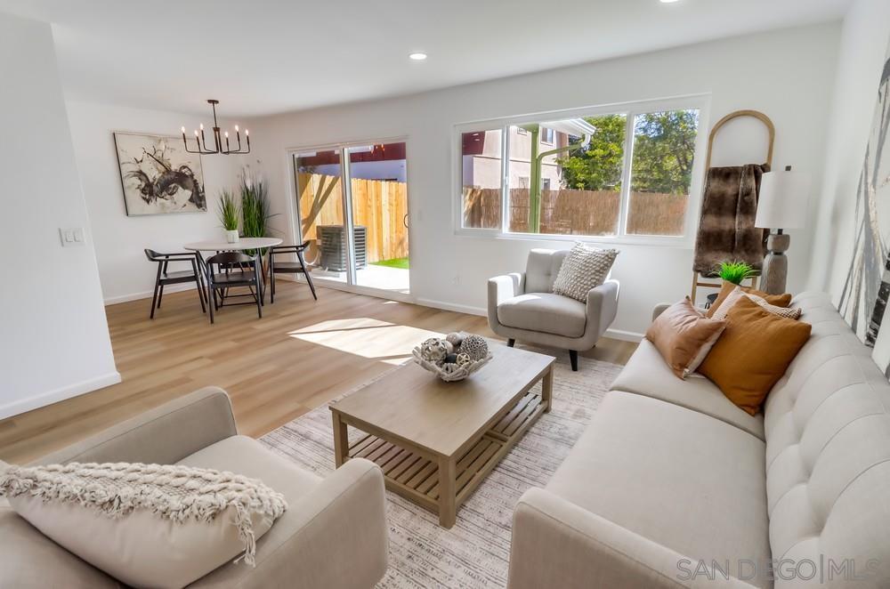 2821 Rosedale Way Spring Valley, CA 91977 - Photo 12 of 70 a living room with furniture and wooden floor