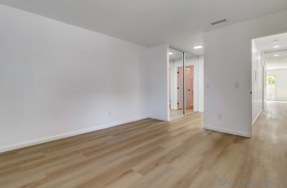 2821 Rosedale Way Spring Valley, CA 91977 - Photo 25 of 70 a view of an empty room with wooden floor and closet