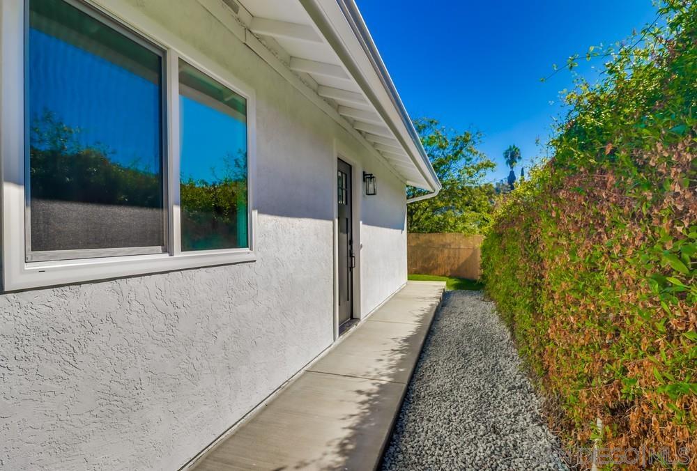 2821 Rosedale Way Spring Valley, CA 91977 - Photo 5 of 70 a view of a pathway of a house with backyard