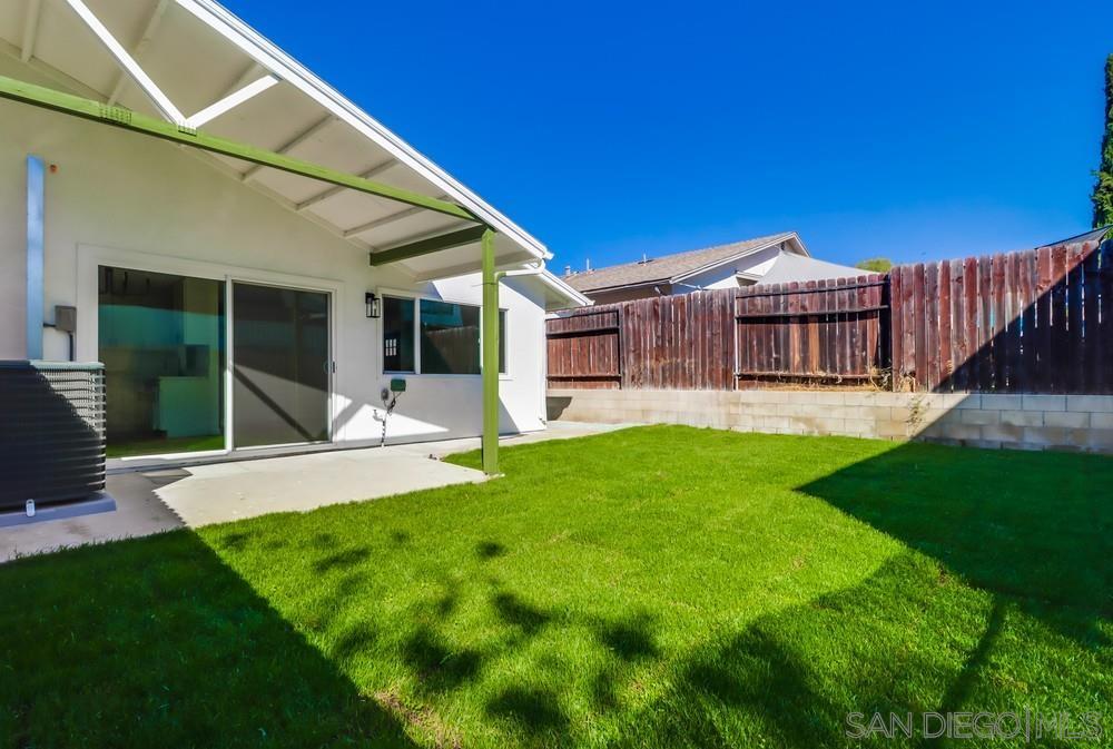 2821 Rosedale Way Spring Valley, CA 91977 - Photo 61 of 70 a view of a house with a backyard and a patio