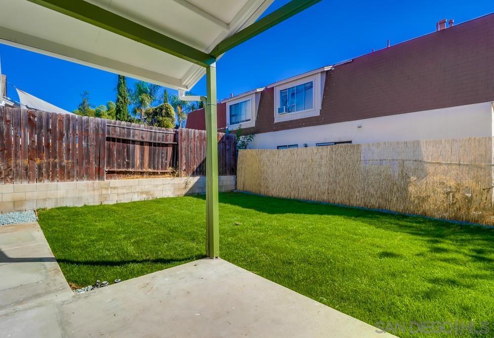 2821 Rosedale Way Spring Valley, CA 91977 - Photo 62 of 70 a view of a house with backyard and a fence