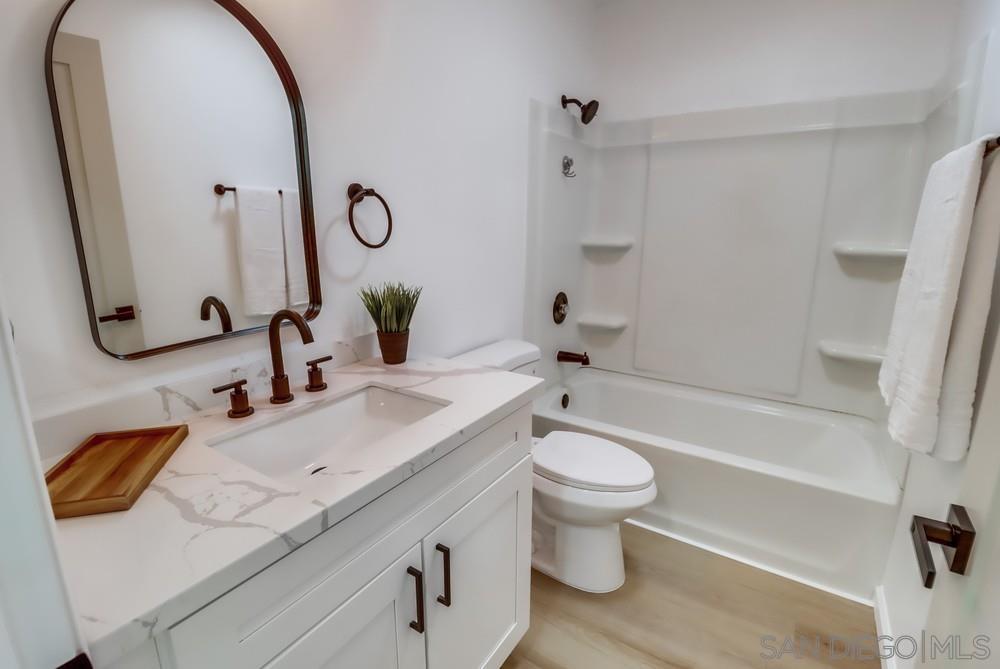 2821 Rosedale Way Spring Valley, CA 91977 - Photo 65 of 70 a bathroom with a sink and a mirror